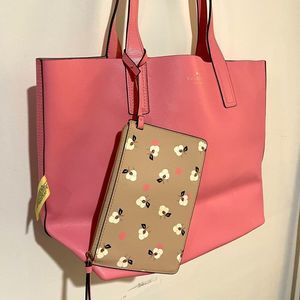 Kate spade leather reversible bag with leather wristlet.Used almost new.
